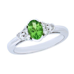 Bague en or blanc sertie d'une tsavorite et de diamants.-Bagues pierres précieuses-Marque:0Référence: D9.116-OB-TSMétal: Or blancTitre: 18 caratsPoids du métal: 3,50 GrType de pierre: TsavoritePoids: 0,54 CtForme - taille: Taille ovaleCouleur: VertType de pierre (2): Diamant(s)Poids (2): 0,03 CtForme - taille (2): Taille brillantCouleur (2): FPureté (2): SI1Comment choisir sa taille de doigt:cliquer pour découvrir notre guide des tailles imprimable-DIAM'S- -DIAM'S NC