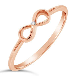 Bague infinity en or rose sertie d'un diamant.-Bagues diamants-Marque: Référence: D9.110-ROMétal: Or roseTitre: 18 caratsPoids du métal: 1,00 GrType de pierre: Diamant(s)Poids: 0,003 CtForme - taille: Taille brillantCouleur: FPureté: SI1 Comment choisir sa taille de doigt:cliquer pour découvrir notre guide des tailles imprimable-DIAM'S- -DIAM'S NC