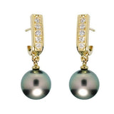 Boucles d'oreilles en or jaune serties de diamants et perles de Tahiti-Boucles d'oreilles perle et diamants-Marque:Référence: D6.40-P299Métal: Or jauneTitre: 18 caratsPoids du métal: 2,60 GrType de pierre: Perle(s) de TahitiForme - taille: Taille brillantPureté: AType de pierre (2): Diamant(s)Poids (2): 0,20 CtForme - taille (2): Taille brillantCouleur (2): FPureté (2): SI1-DIAM'S- -DIAM'S NC