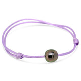 Bracelet petit satin mauve et perle de Tahiti cerclée.-Bracelets perle-Marque:Référence: BRS.7-230-MAType de pierre: Perle(s) de TahitiForme - taille: CercléePureté: A-DIAM'S- -DIAM'S NC