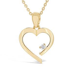 Pendentif coeur en or jaune serti d'un diamant.-Pendentifs & Colliers diamants-Marque:Référence: D3.77Métal: Or jauneTitre: 18 caratsPoids du métal: 2,00 GrType de pierre: Diamant(s)Poids: 0,04 CtForme - taille: Taille brillantCouleur: FPureté: SI1-DIAM'S- -DIAM'S NC