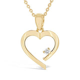 Pendentif coeur en or jaune serti d'un diamant.-Pendentifs & Colliers diamants-Marque:Référence: D3.77Métal: Or jauneTitre: 18 caratsPoids du métal: 2,00 GrType de pierre: Diamant(s)Poids: 0,04 CtForme - taille: Taille brillantCouleur: FPureté: SI1-DIAM'S- -DIAM'S NC