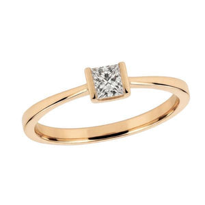 Solitaire en or jaune serti d'un diamant.
